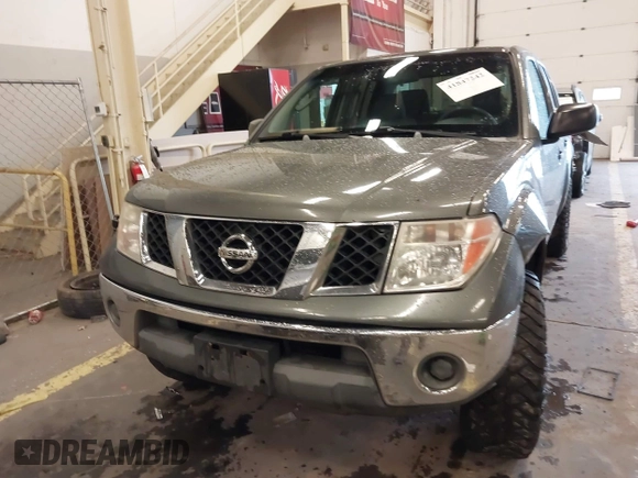2005 Nissan Frontier 4WD LE with VIN 1N6AD07W95C411421, listed as a IAAI auction lot 41847242 with 209,816 mi miles. Bid and sale history available at carsss.com. Image 12.
