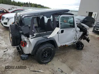 2002 Jeep Wrangler Sport with VIN 1J4FA49S32P733909, listed as a Copart auction lot 72776204 with 157,508 mi miles and Non Repairable. Bid and sale history available at carsss.com. Image 3.