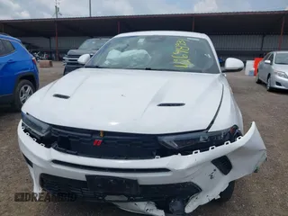 2024 Dodge Hornet R/T with VIN ZACPDFCW0R3A28742, listed as a IAAI auction lot 42698231 with 34,181 mi miles and . Bid and sale history available at DreamBid. Image 12.