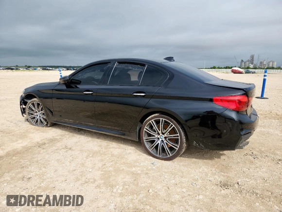 2018 BMW 5 Series 540i xDrive with VIN WBAJE7C52JWD52730, listed as a Copart auction lot 60297425 with 104,208 mi miles and Salvage title. Bid and sale history available at DreamBid. Image 2.