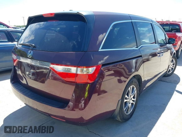 2011 Honda Odyssey EX-L with VIN 5FNRL5H60BB094647, listed as a IAAI auction lot 42223712 with 202,612 mi miles and . Bid and sale history available at carsss.com. Image 4.