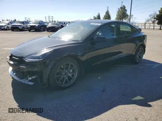 2021 Tesla Model 3 Standard Range Plus with VIN 5YJ3E1EAXMF027428, listed as a Copart auction lot 45730105 with 27,385 mi miles and Salvage Title. Bid and sale history available at DreamBid. Image 1.