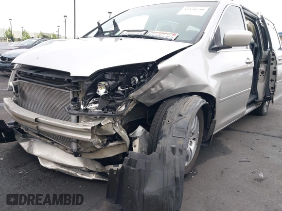 2007 Honda Odyssey EX-L with VIN 5FNRL38687B423865, listed as a IAAI auction lot 42190749 with 215,664 mi miles and . Bid and sale history available at DreamBid. Image 6.