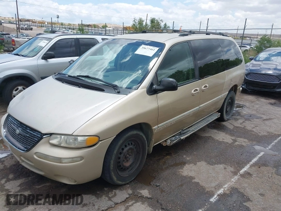 1999 Chrysler Town & Country LXi with VIN 1C4GP54L0XB512495, listed as a IAAI auction lot 39677461 with 284,495 mi miles. Bid and sale history available at carsss.com. Image 2.