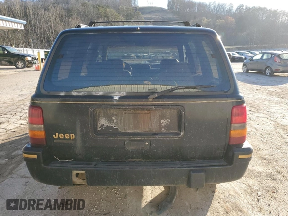 1994 Jeep Grand Cherokee Limited with VIN 1J4GZ78S0RC357283, listed as a Copart auction lot 49236995 with 84,306 mi miles and Salvage title. Bid and sale history available at DreamBid. Image 6.