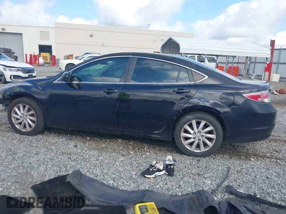 2009 Mazda 6 i Sport with VIN 1YVHP81A595M00988, listed as a IAAI auction lot 42622271 with 151,652 mi miles and . Bid and sale history available at DreamBid. Image 14.