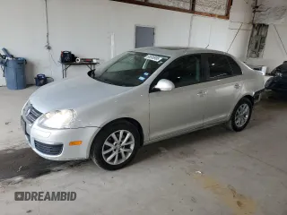 2010 Volkswagen Jetta SEL with VIN 3VWRX7AJ4AM100858, listed as a Copart auction lot 60695995 with 158,477 mi miles and Salvage title. Bid and sale history available at DreamBid. Image 1.