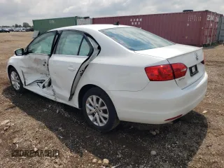 2014 Volkswagen Jetta Sedan SE w/Connectivity with VIN 3VWD07AJ0EM441517, listed as a Copart auction lot 65257454 with 132,987 mi miles and Salvage Title. Bid and sale history available at carsss.com. Image 2.