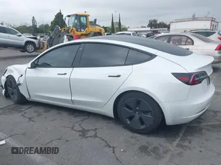 2021 Tesla Model 3 Long Range with VIN 5YJ3E1EB6MF878957, listed as a IAAI auction lot 41915482 with 59,578 mi miles. Bid and sale history available at carsss.com. Image 14.