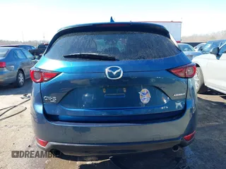 2020 Mazda CX-5 Grand Touring with VIN JM3KFBDM9L0756826, listed as a IAAI auction lot 41866290 with 145,567 mi miles. Bid and sale history available at carsss.com. Image 16.