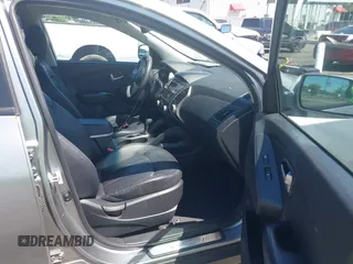 2013 Hyundai Tucson GLS with VIN KM8JU3AC4DU588062, listed as a IAAI auction lot 42080348 with 76,937 mi miles. Bid and sale history available at carsss.com. Image 5.