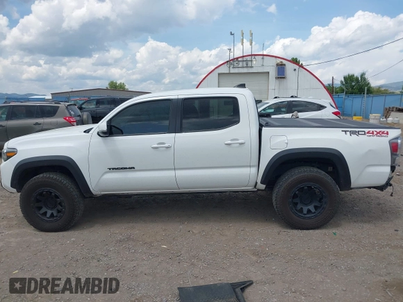2022 Toyota Tacoma SR with VIN 3TMCZ5AN1NM478457, listed as a IAAI auction lot 42479107 with 59,547 mi miles and . Bid and sale history available at DreamBid. Image 15.