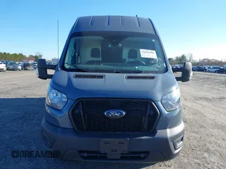 2021 Ford Transit Cargo with VIN 1FTBR3X8XMKA57960, listed as a IAAI auction lot 41842606 with 5,176 mi miles and . Bid and sale history available at DreamBid. Image 13.