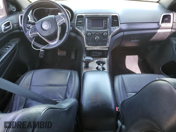 2014 Jeep Grand Cherokee Laredo with VIN 1C4RJFAG4EC210321, listed as a Copart auction lot 53574595 with 119,650 mi miles and Salvage Title. Bid and sale history available at DreamBid. Image 8.