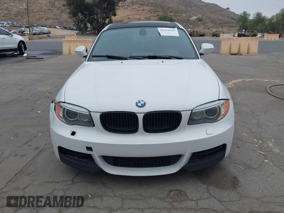 2013 BMW 1 Series 135i with VIN WBAUC9C54DVY60154, listed as a IAAI auction lot 42354743 with 159,571 mi miles and . Bid and sale history available at DreamBid. Image 12.