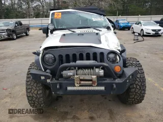 2007 Jeep Wrangler Unlimited X with VIN 1J4GA39147L207549, listed as a Copart auction lot 47291165 with 141,325 mi miles and Salvage title. Bid and sale history available at DreamBid. Image 5.