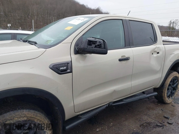 2022 Ford Ranger XL with VIN 1FTER4FHXNLD42710, listed as a IAAI auction lot 41553725 with 14,079 mi miles. Bid and sale history available at carsss.com. Image 6.