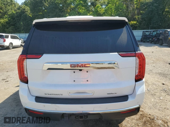 2021 GMC Yukon SLT with VIN 1GKS1BKT0MR425247, listed as a Copart auction lot 69205584 with 72,952 mi miles and Salvage Title. Bid and sale history available at carsss.com. Image 6.