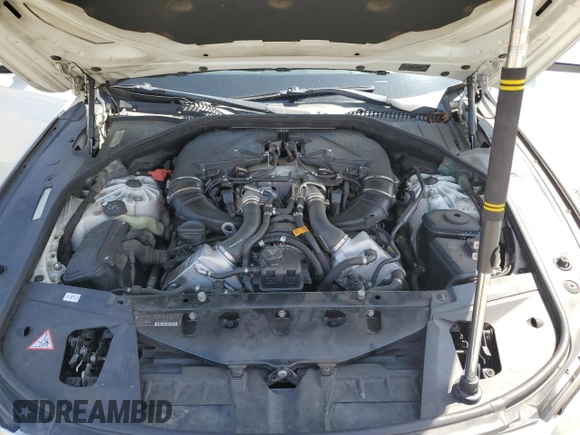 2012 BMW 7 Series 750i xDrive with VIN WBAKC6C56CDX99416, listed as a Copart auction lot 54857715 with 114,198 mi miles and Salvage Title. Bid and sale history available at DreamBid. Image 11.