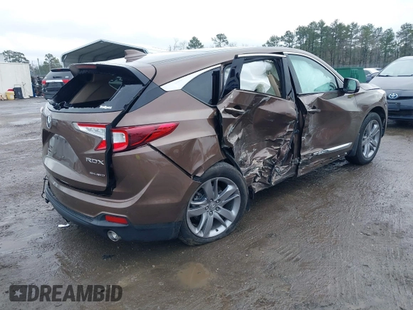 2019 Acura RDX w/Advance Pkg with VIN 5J8TC2H75KL017199, listed as a IAAI auction lot 41565130 with 67,880 mi miles. Bid and sale history available at carsss.com. Image 4.