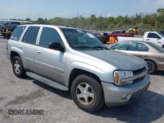 2004 Chevrolet TrailBlazer LT with VIN 1GNDS13SX42239605, listed as a IAAI auction lot 41862159 with 235,797 mi miles and . Bid and sale history available at DreamBid. Image 1.