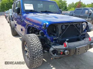 2018 Jeep Wrangler Unlimited Rubicon with VIN 1C4HJXFG8JW184793, listed as a IAAI auction lot 42429098 with 86,580 mi miles and . Bid and sale history available at DreamBid. Image 6.