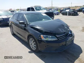 2015 Volkswagen Jetta SE z VIN 3VWD17AJ8FM418758, wystawiony jako IAAI lot #42449833 z przebiegiem 146 618 mil mil oraz . Historia ofert i sprzedaży dostępna na DreamBid. Obrazek 13.