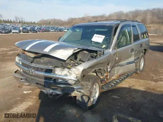 2003 Chevrolet Tahoe LS with VIN 1GNEK13V03J154985, listed as a IAAI auction lot 41708954 with 203,826 mi miles. Bid and sale history available at carsss.com. Image 2.