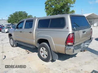 2007 Toyota Tacoma PreRunner z VIN 3TMJU62N87M040287, wystawiony jako IAAI lot #42375199 z przebiegiem 403 876 mil mil oraz . Historia ofert i sprzedaży dostępna na DreamBid. Obrazek 3.