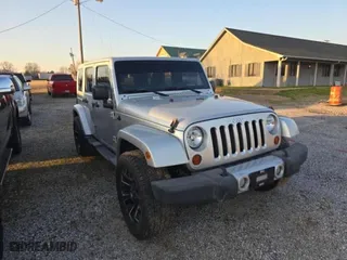 2011 Jeep Wrangler Unlimited Sahara with VIN 1J4BA5H16BL627992, listed as a Copart auction lot 54337305 with 197,845 mi miles and Clean Title. Bid and sale history available at carsss.com. Image 1.