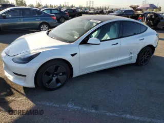 2023 Tesla Model 3 with VIN 5YJ3E1EA5PF583411, listed as a Copart auction lot 74895804 with 17,514 mi miles and Salvage title. Bid and sale history available at DreamBid. Image 1.
