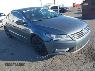 2014 Volkswagen CC R-Line with VIN WVWBP7ANXEE523222, listed as a IAAI auction lot 41383890 with 179,501 mi miles and . Bid and sale history available at DreamBid. Image 1.