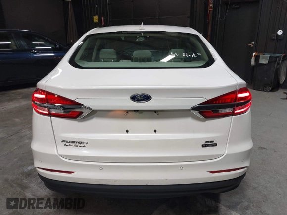 2020 Ford Fusion SE z VIN 3FA6P0LU8LR142370, wystawiony jako IAAI lot #42457342 z przebiegiem 53 808 mil mil oraz . Historia ofert i sprzedaży dostępna na DreamBid. Obrazek 16.