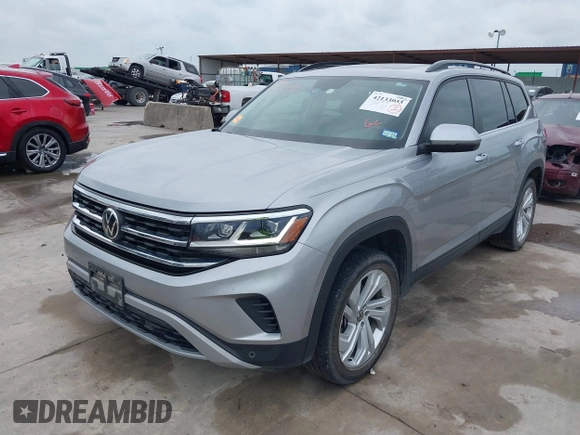 2021 Volkswagen Atlas SE с VIN 1V2JR2CA2MC539992, выставлен на аукционе IAAI как лот 42133933 с пробегом 82 287 миль миль и . История ставок и продаж доступна на DreamBid. Изображение 18.