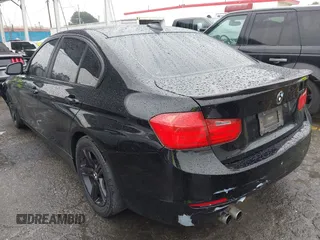 2015 BMW 3 Series 328i with VIN WBA3A5C59FF606236, listed as a IAAI auction lot 41690502 with 115,085 mi miles. Bid and sale history available at carsss.com. Image 3.