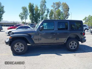 2022 Jeep Wrangler Unlimited Sport S z VIN 1C4HJXDG6NW134306, wystawiony jako IAAI lot #42206796 z przebiegiem 45 303 mil mil oraz . Historia ofert i sprzedaży dostępna na DreamBid. Obrazek 14.