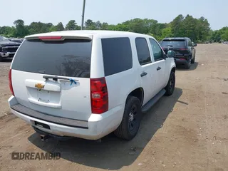 2014 Chevrolet Tahoe Commercial с VIN 1GNLC2E07ER228838, выставлен на аукционе IAAI как лот 42410417 с пробегом 140 342 миль миль и . История ставок и продаж доступна на DreamBid. Изображение 4.