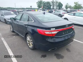 2013 Hyundai Azera with VIN KMHFG4JGXDA227569, listed as a IAAI auction lot 42384304 with 151,007 mi miles and . Bid and sale history available at DreamBid. Image 3.