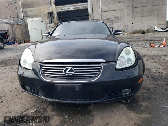 2003 Lexus SC 430 z VIN JTHFN48Y530045385, wystawiony jako Copart lot #72208434 z przebiegiem 211 684 mil mil oraz Szkody całkowita. Historia ofert i sprzedaży dostępna na DreamBid. Obrazek 5.