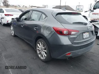 2014 Mazda 3 s Touring with VIN JM1BM1L35E1208952, listed as a IAAI auction lot 42121077 with 183,985 mi miles. Bid and sale history available at carsss.com. Image 3.