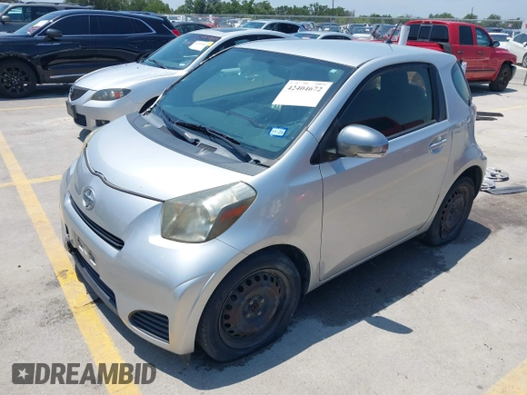 2012 Scion iQ with VIN JTNJJXB07CJ018562, listed as a IAAI auction lot 42404672 with 79,867 mi miles and . Bid and sale history available at DreamBid. Image 18.