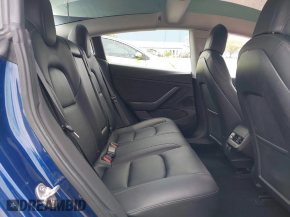 2021 Tesla Model 3 Long Range with VIN 5YJ3E1EB6MF878411, listed as a IAAI auction lot 41986947 with 71,978 mi miles and . Bid and sale history available at DreamBid. Image 8.