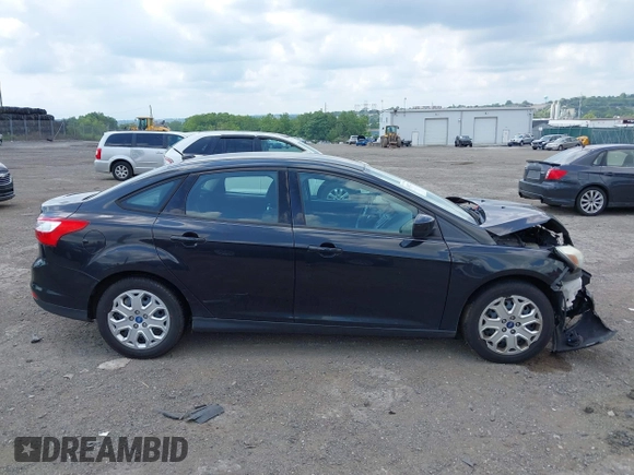 2012 Ford Focus SE z VIN 1FAHP3F26CL157551, wystawiony jako IAAI lot #42697232 z przebiegiem 135 024 mil mil oraz . Historia ofert i sprzedaży dostępna na DreamBid. Obrazek 14.