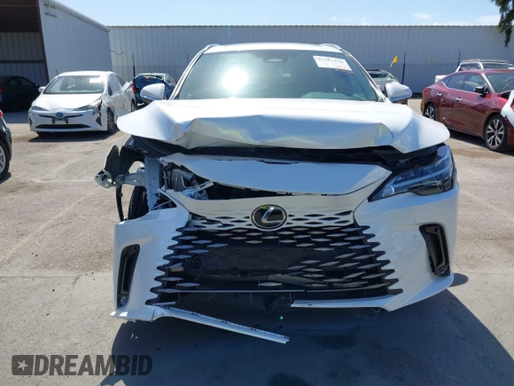 2024 Lexus RX 350h with VIN 2T2BBMCA2RC041498, listed as a IAAI auction lot 42267376 with 14,263 mi miles and . Bid and sale history available at DreamBid. Image 13.