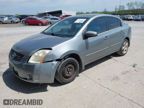 2009 Nissan Sentra S FE+ z VIN 3N1AB61E99L671293, wystawiony jako IAAI lot #42042248 z przebiegiem 126 899 mil mil oraz . Historia ofert i sprzedaży dostępna na DreamBid. Obrazek 2.