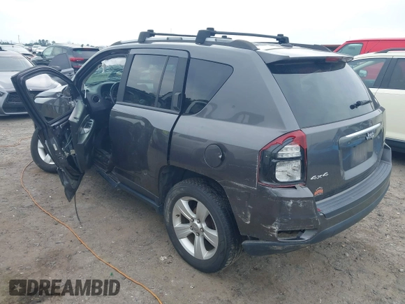 2016 Jeep Compass Latitude with VIN 1C4NJDEB4GD687300, listed as a IAAI auction lot 41800186 with 169,374 mi miles. Bid and sale history available at carsss.com. Image 3.