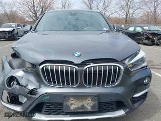 2019 BMW X1 xDrive28i with VIN WBXHT3C51K5L90571, listed as a IAAI auction lot 41909209 with 35,902 mi miles. Bid and sale history available at carsss.com. Image 12.