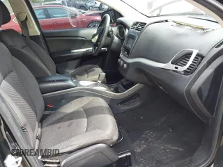 2015 Dodge Journey SXT with VIN 3C4PDCBB3FT577121, listed as a IAAI auction lot 41855712 with Not Provided miles and . Bid and sale history available at DreamBid. Image 5.