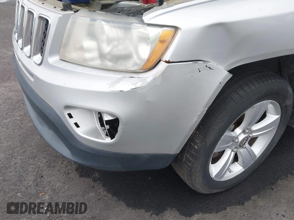 2012 Jeep Compass Sport with VIN 1C4NJCBA5CD622424, listed as a IAAI auction lot 42211700 with 120,945 mi miles and . Bid and sale history available at carsss.com. Image 6.