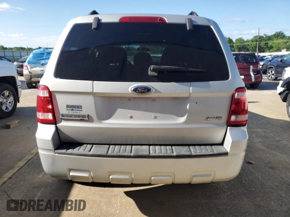 2008 Ford Escape XLT z VIN 1FMCU931X8KA91977, wystawiony jako Copart lot #57676725 z przebiegiem 119 460 mil mil oraz Nie do naprawy • Non repairable. Historia ofert i sprzedaży dostępna na DreamBid. Obrazek 6.